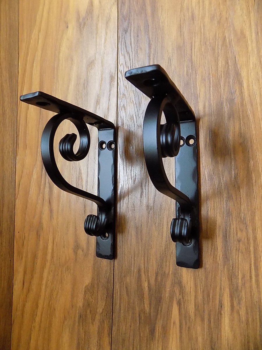 hand made shelf brackets..........Wrought Iron Folksy