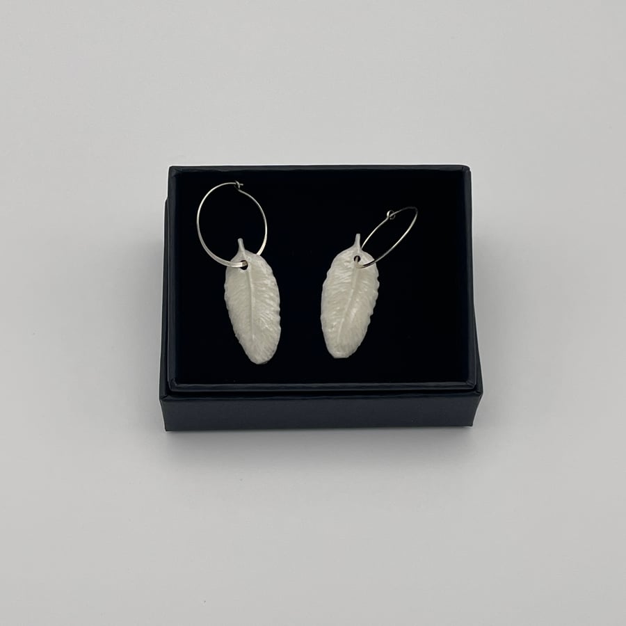 Porcelain white feather earrings
