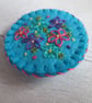 Hand Embroidered Floral Brooch on Turquoise Wool Felt - Image 1