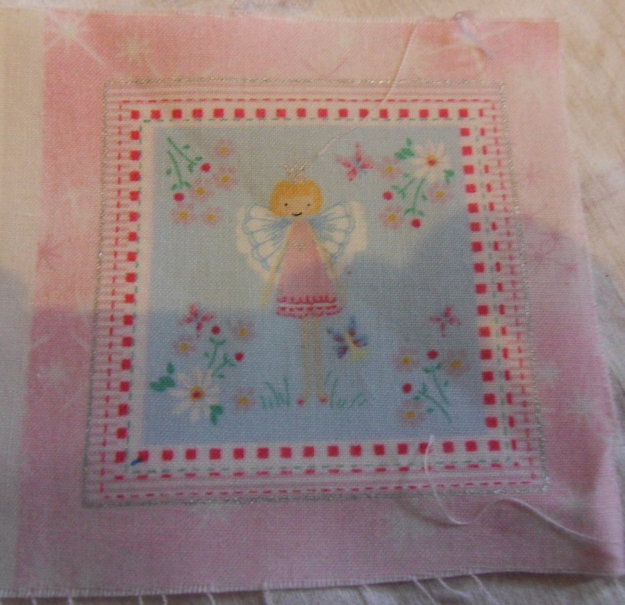 100% cotton fabric squares. Pink fairy with white wings. (49)