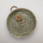 Susy Builds Clay