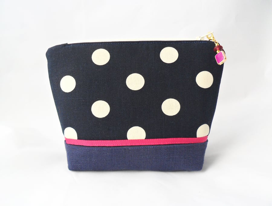Navy and white spotted make-up bag