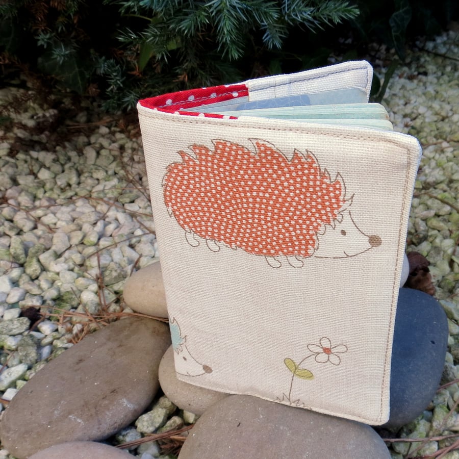 Hedgehogs.. A passport cover with a whimsical hedgehog design. Passport sleeve.