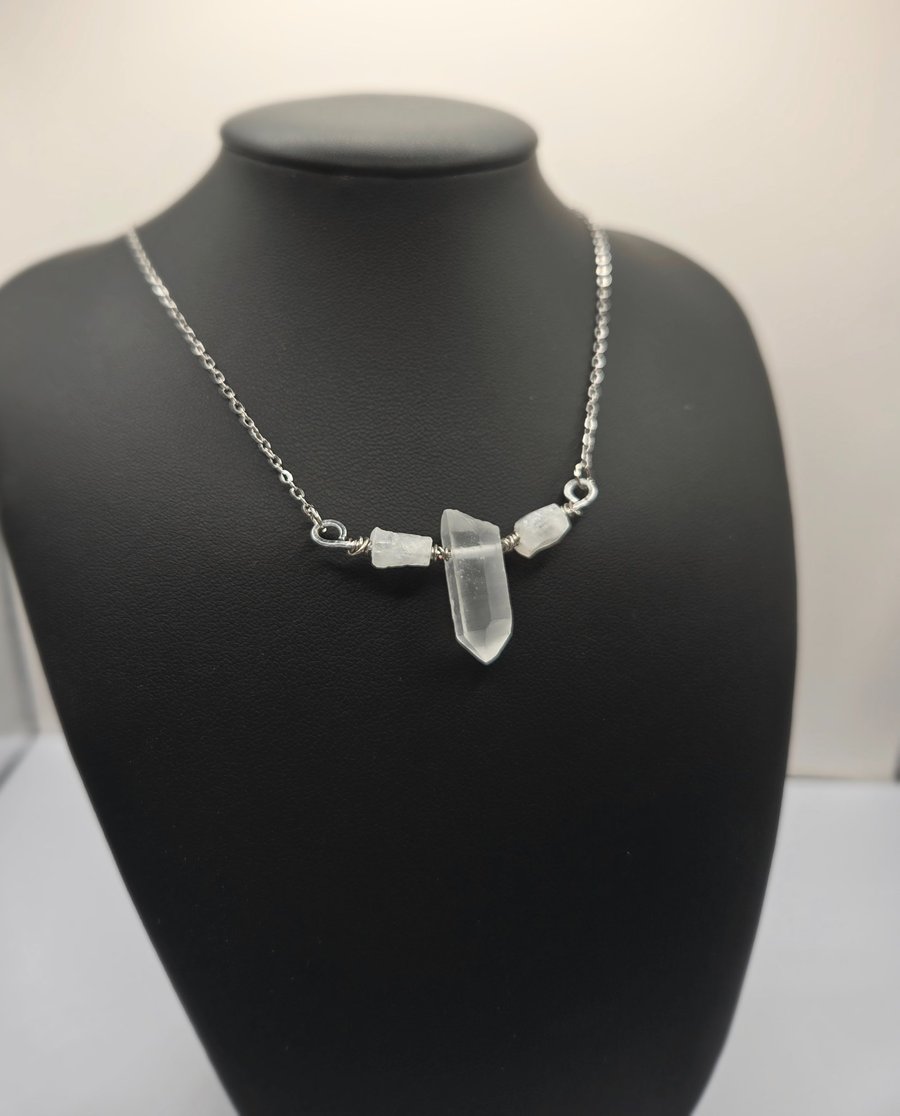 Necklace with wire wrapped clear quartz crystal pendant
