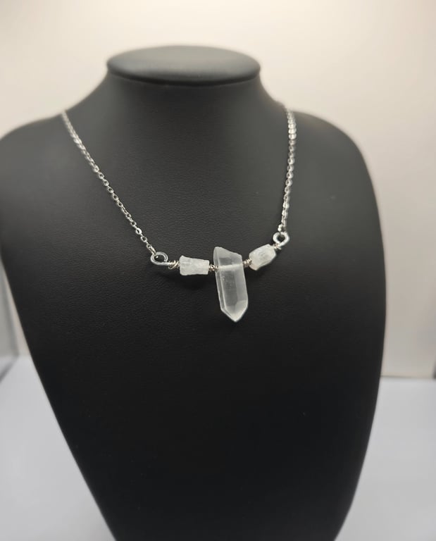 Necklace with wire wrapped clear quartz crystal pendant
