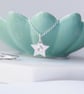 Silver Star Pendant with April Birthstone White Topaz