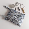 Liberty remnant make up bag or purse in a blue ditsy print.