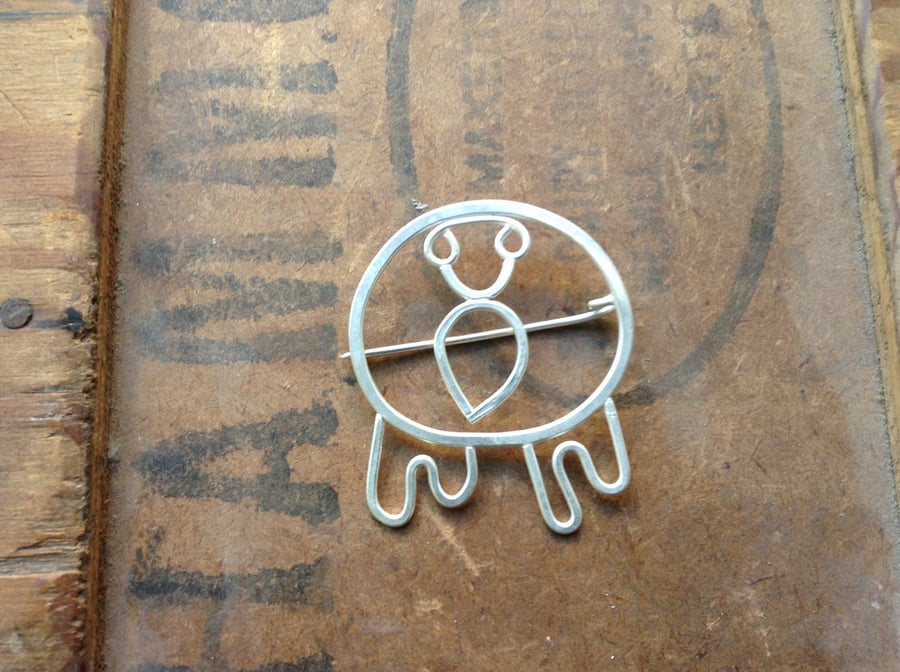 A penguin brooch from a child's drawing, the perfect gift for any family member