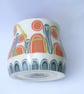 Ceramic hand thrown pot with unique orange and blue decoration - Image 8