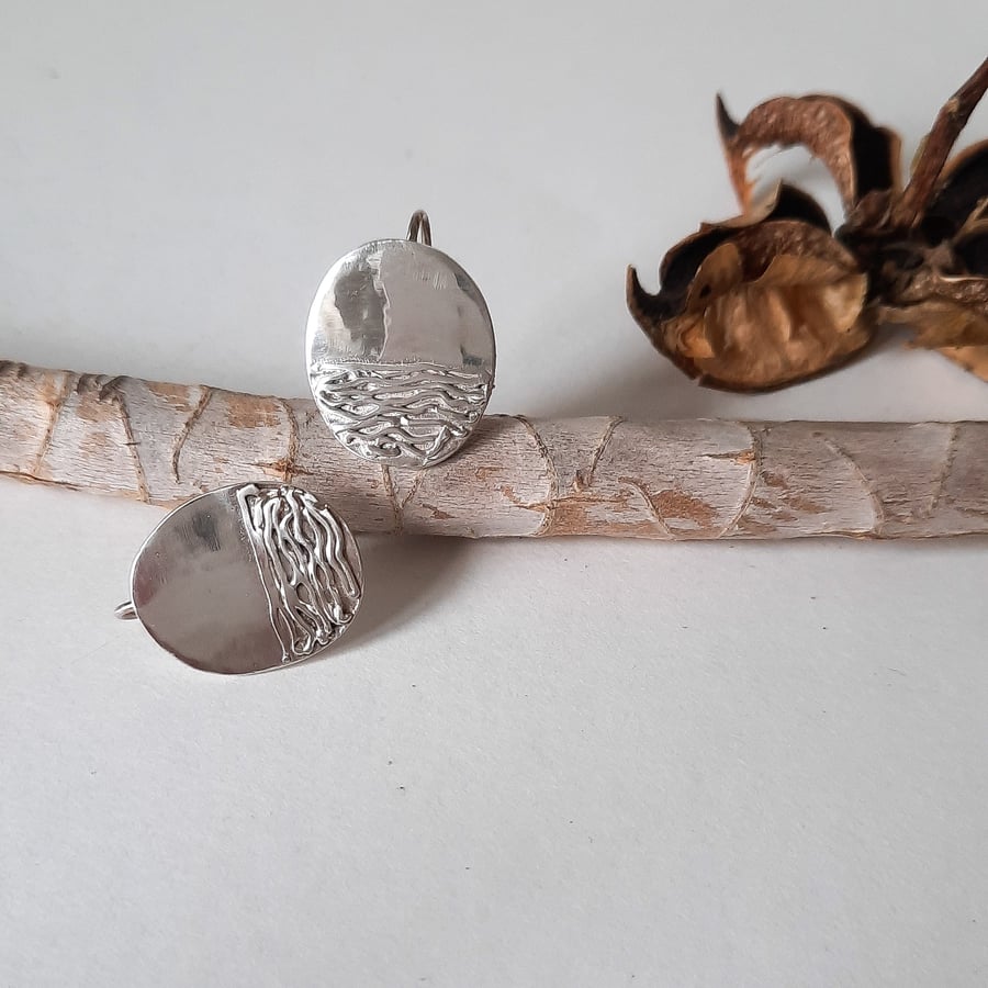 Fine Silver Oval Earrings With Wavy Lines Pattern