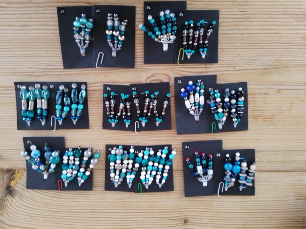 set of colour coordinated beaded gift decorations