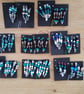 set of colour coordinated beaded gift decorations