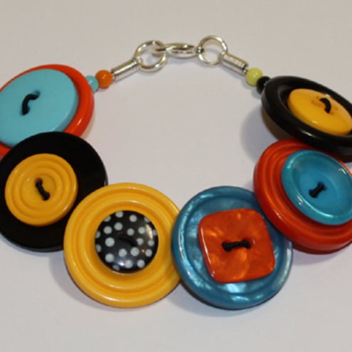 Orange, Black, Turquoise and Yellow button bracelet