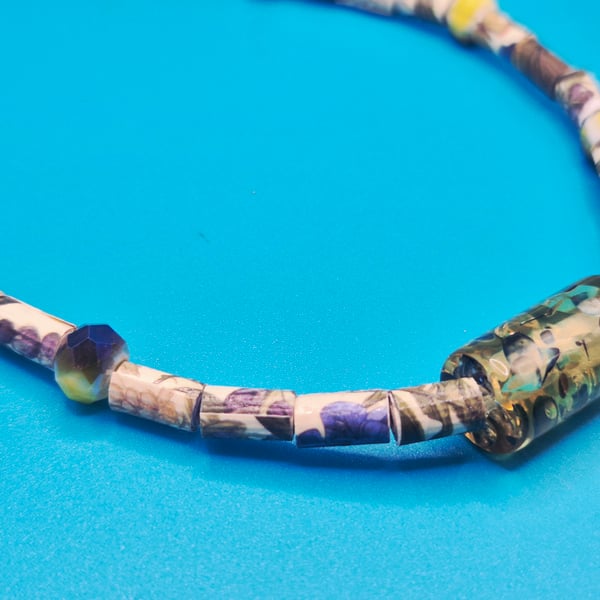 Nature theme paper beaded necklace with resin central piece