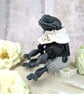 'Rospo', a black porcelain and textile frog imp. - Image 5