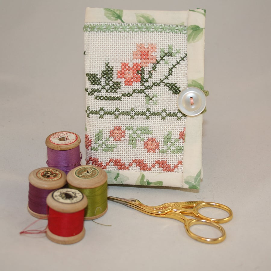 Needle book from recycled cross stitch