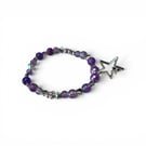 A stunning purple and silver toned handmade bracelet 