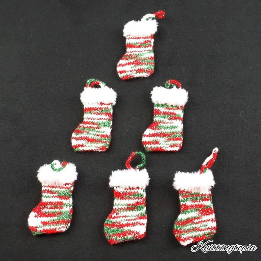 Hand knitted red green and white fur trim Christmas stockings tree decorations 
