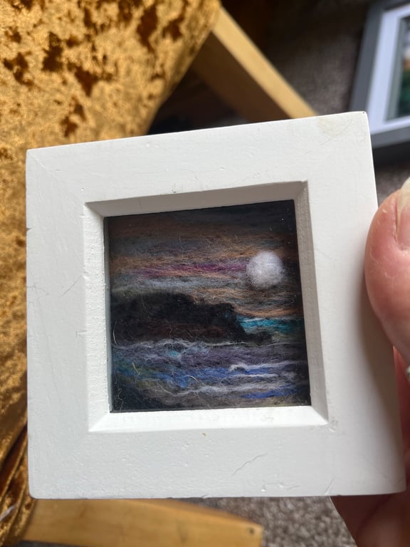 Peach purple Sunset over cliffs and sea needle felt  white box frame 