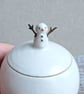 Very small handmade ceramic snowball lidded pot, mini snowman with twig arms - Image 2