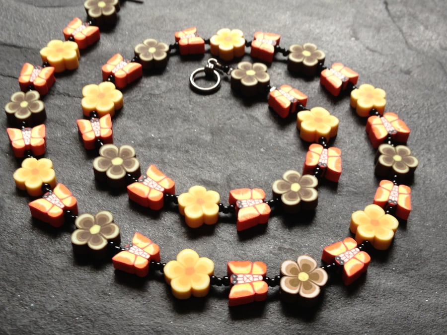 Floral Butterflies Polymer Clay Necklace 19 inches Red, Yellow Orange and Brown
