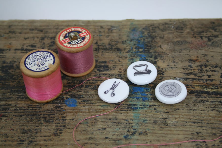 A set of three bone china buttons