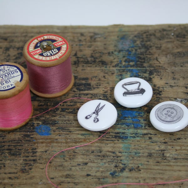 A set of three bone china buttons