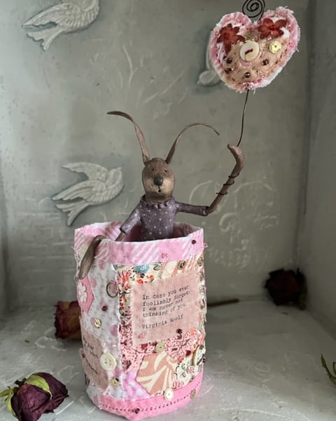 Paper mache hare in hand stitched fabric art pot