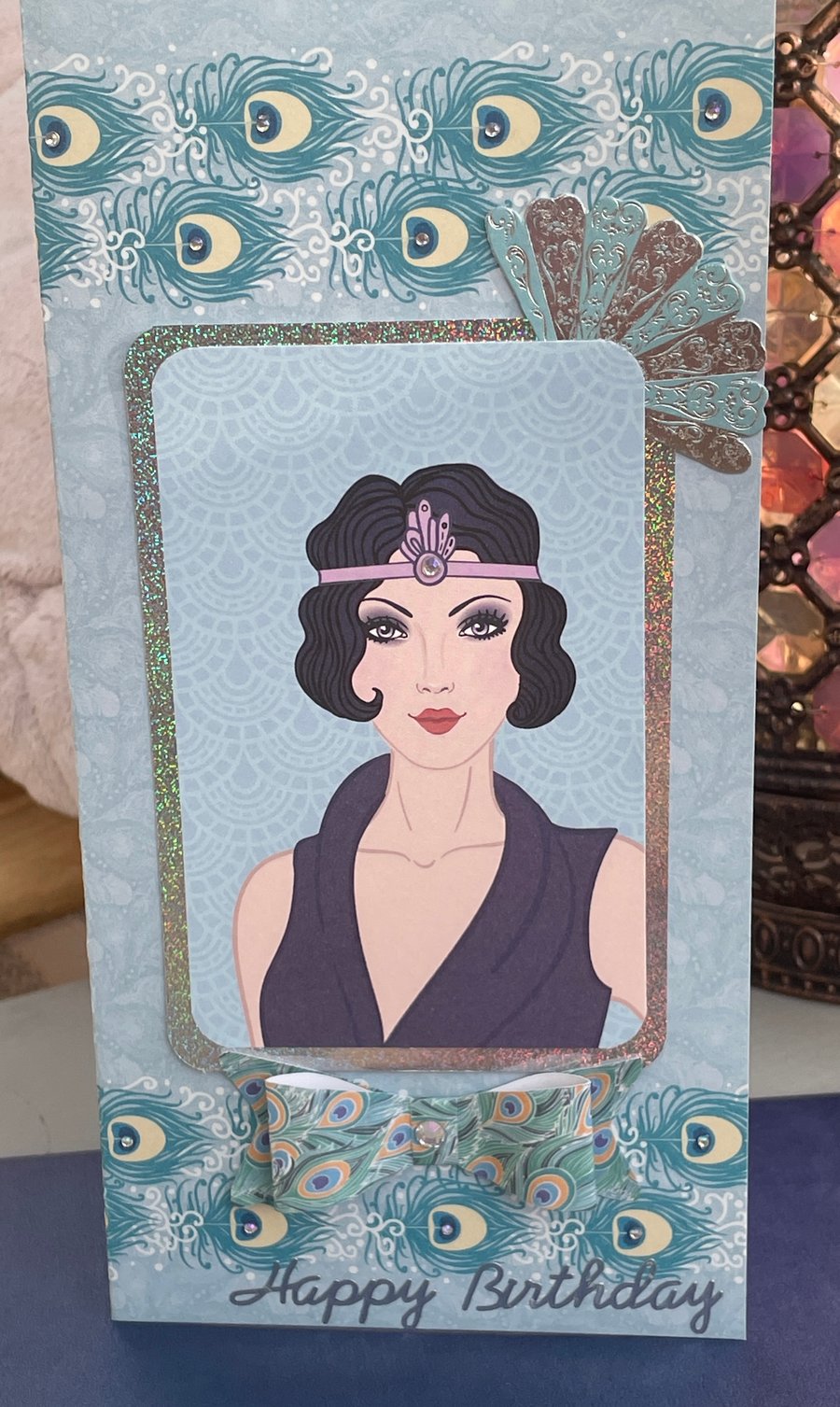 Elegant Art Deco flapper girl and peacock feather birthday card