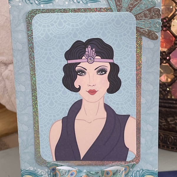 Elegant flapper girl and peacock feather birthday card