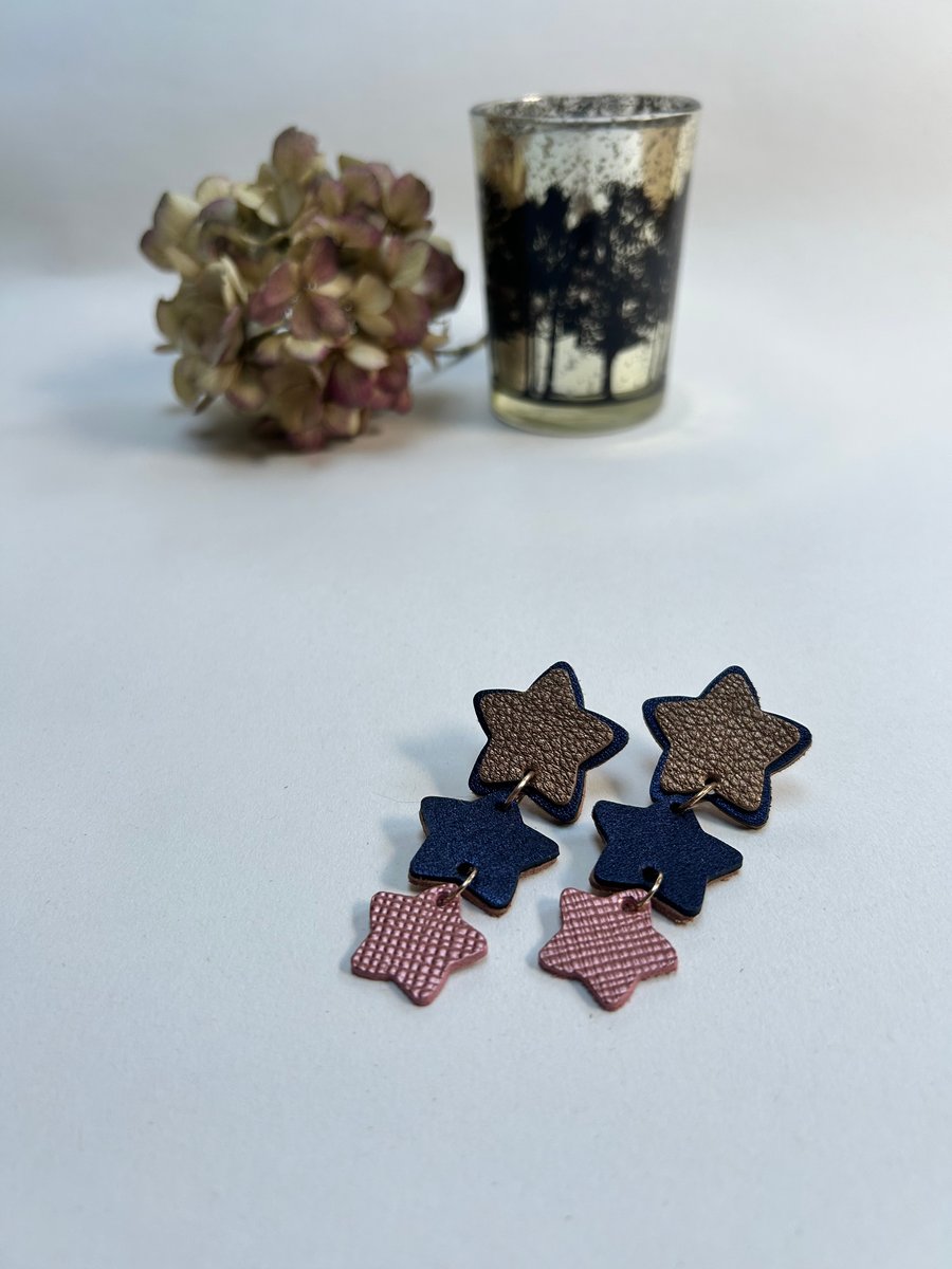 Star statement leather drop earrings 