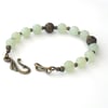 Pale green jade and bronze handmade bracelet