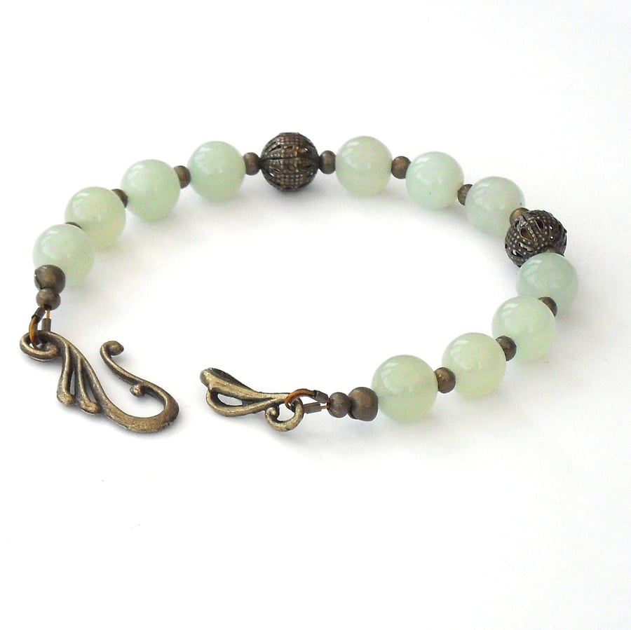 Pale green jade and bronze handmade bracelet