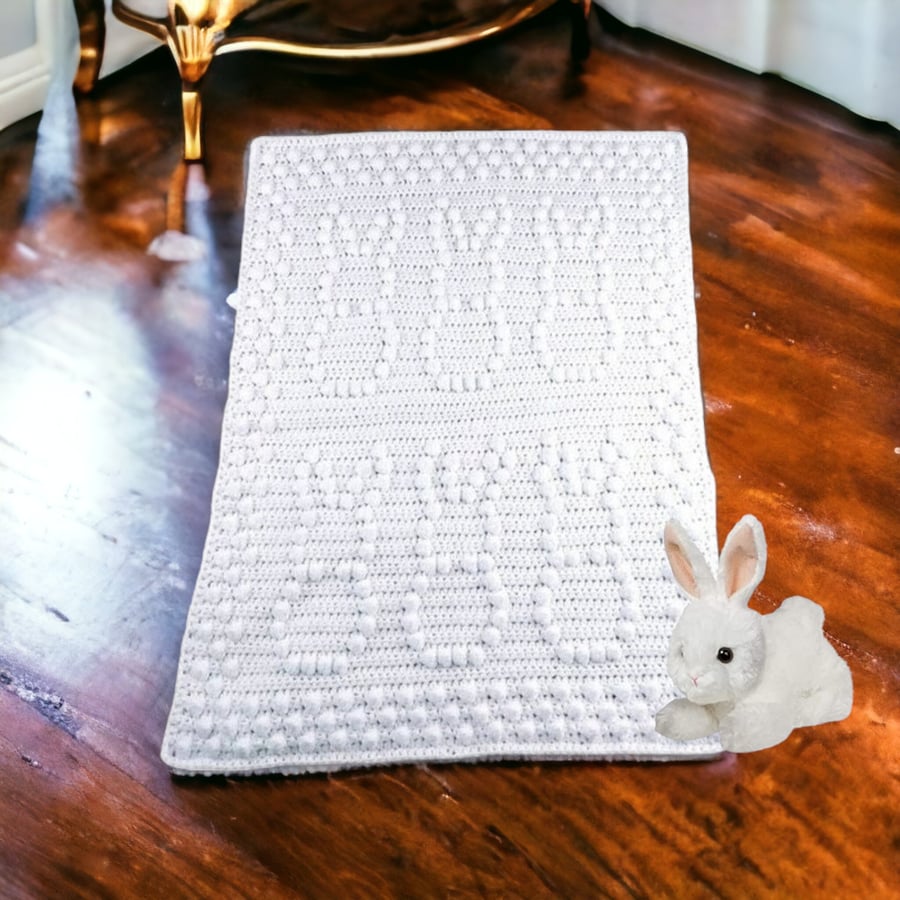 Crochet baby blanket in white with puff bobbly bunny pattern