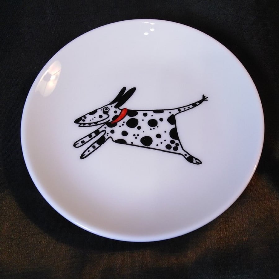Running Dalmatian on a shallow dish, decorated with a friendly running Dalmatian