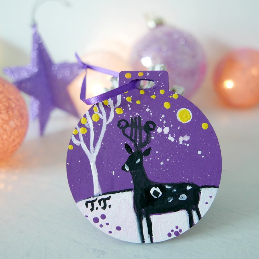 Purple Christmas Ornament with Deer Illustration and Winter Landscape