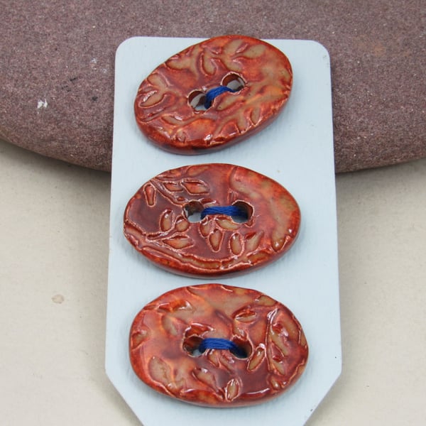 3 Medium Oval Bright Copper Leaf Pattern Ceramic Buttons