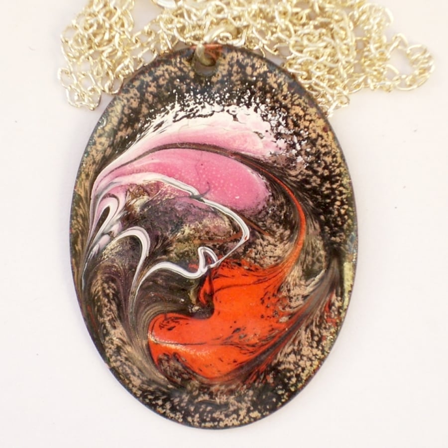 large oval pendant - scrolled white, pink, red, over black
