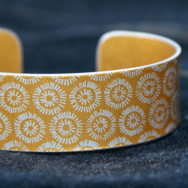 Geometric sunshine pattern cuff bracelet yellow