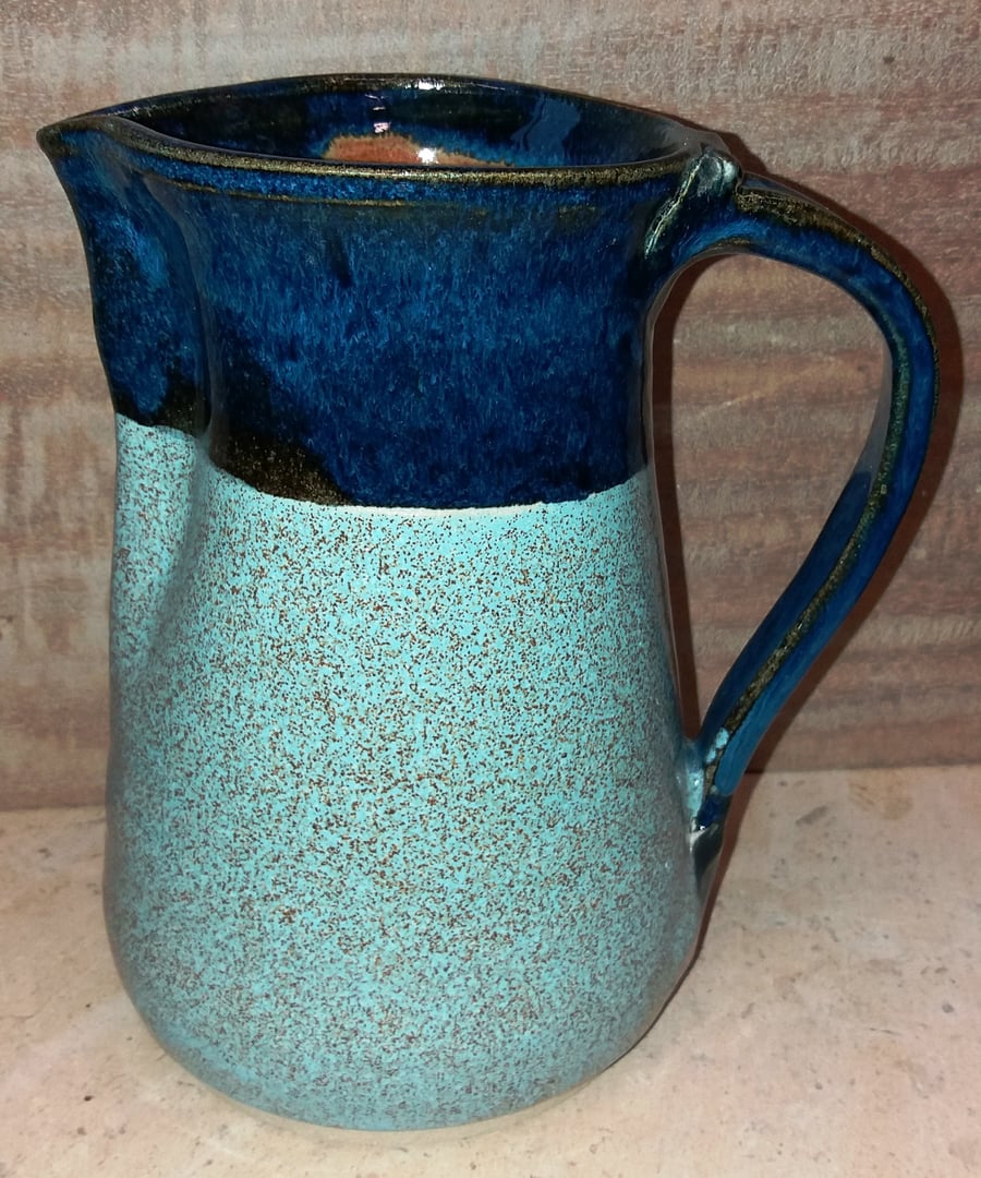 Large dual coloured ceramic pitcher
