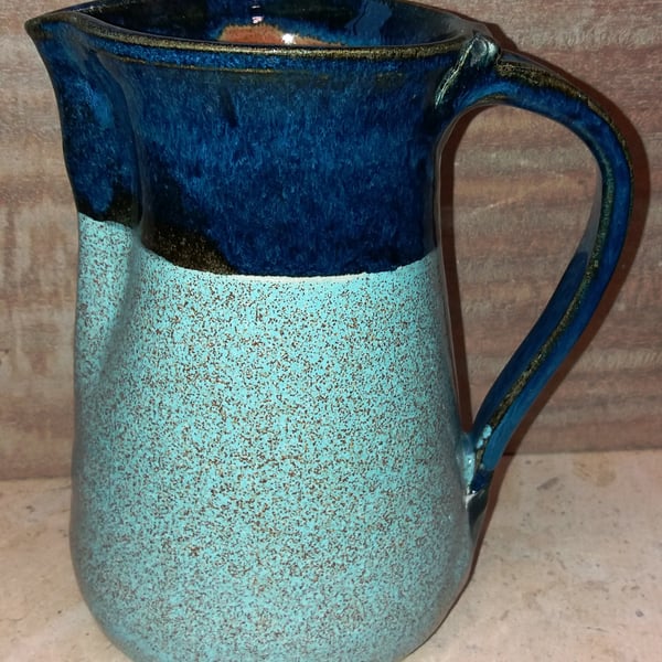 Large dual coloured ceramic pitcher