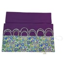 Circular needle case made from Liberty floral fabric, fixed circular sock needle