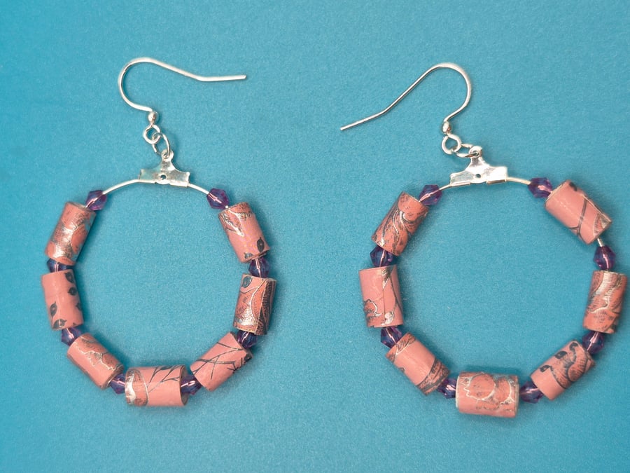 Hoop earrings threaded with with dusky pink paper beads