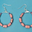 Hoop earrings threaded with dusky pink paper beads