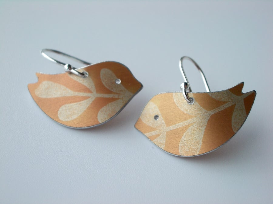 Bird earrings with leaf print in dusky orange