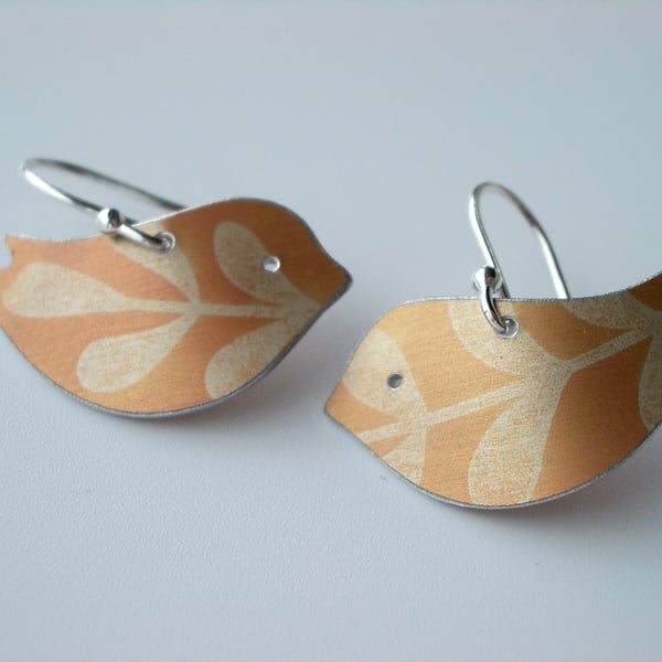 Bird earrings with leaf print in dusky orange