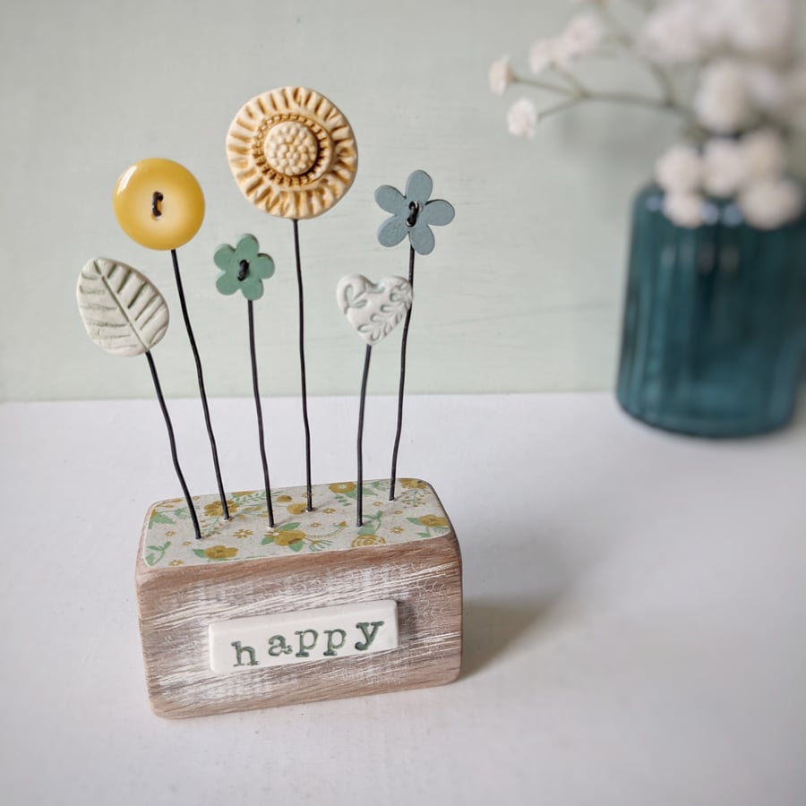 Clay and Button Flower Garden in a Wood Block 'happy'