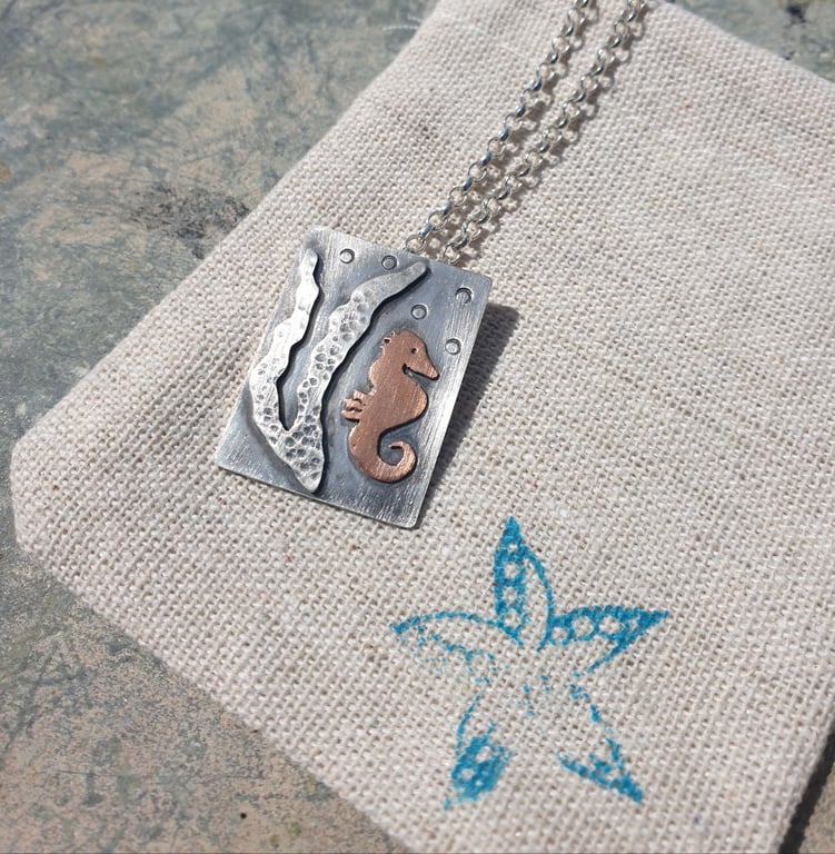 Silver under the sea pendant with seahorse