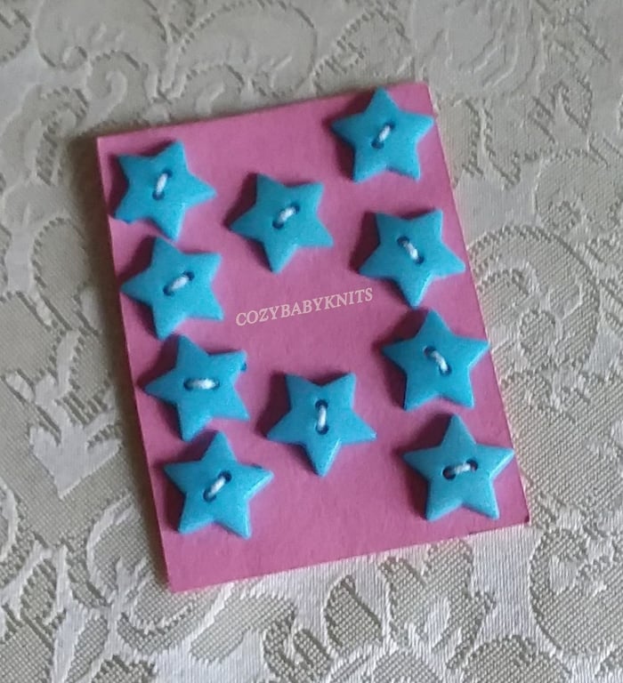 16MM BABY BLUE PLASTIC STAR BUTTONS WITH TWO HOLES FOR ATTACHING 