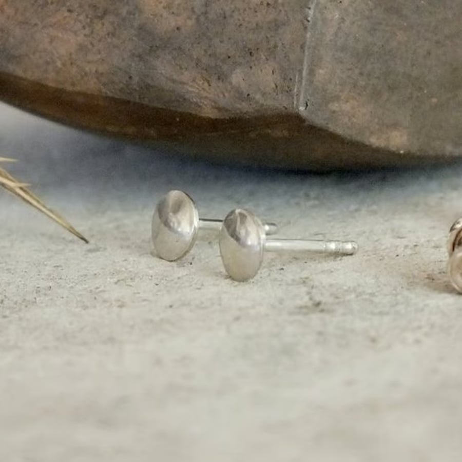 Minimalist round silver stud earrings; small everyday studs